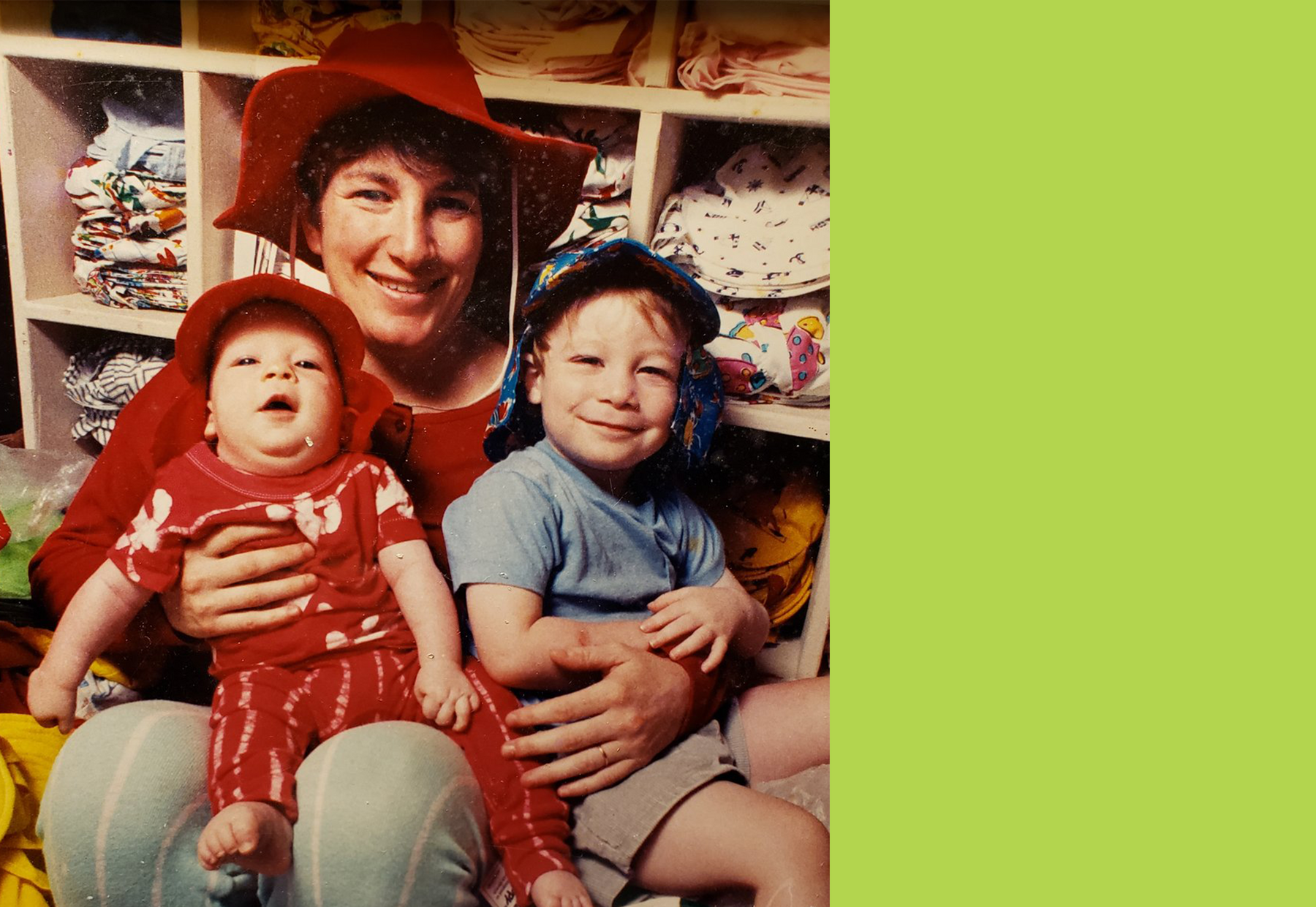 Laurie, owner, sitting down with her daughter and soon all wearing flap happy hats